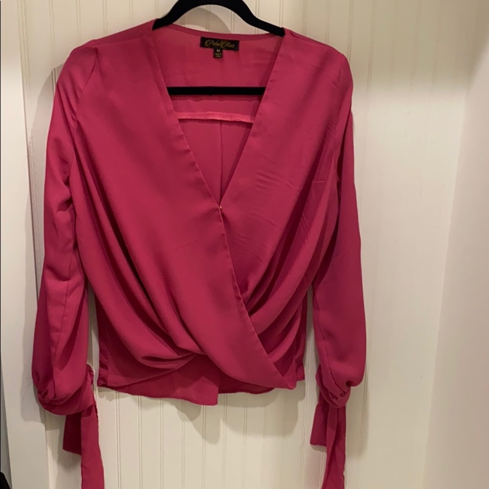 Crisscross slitted pink top